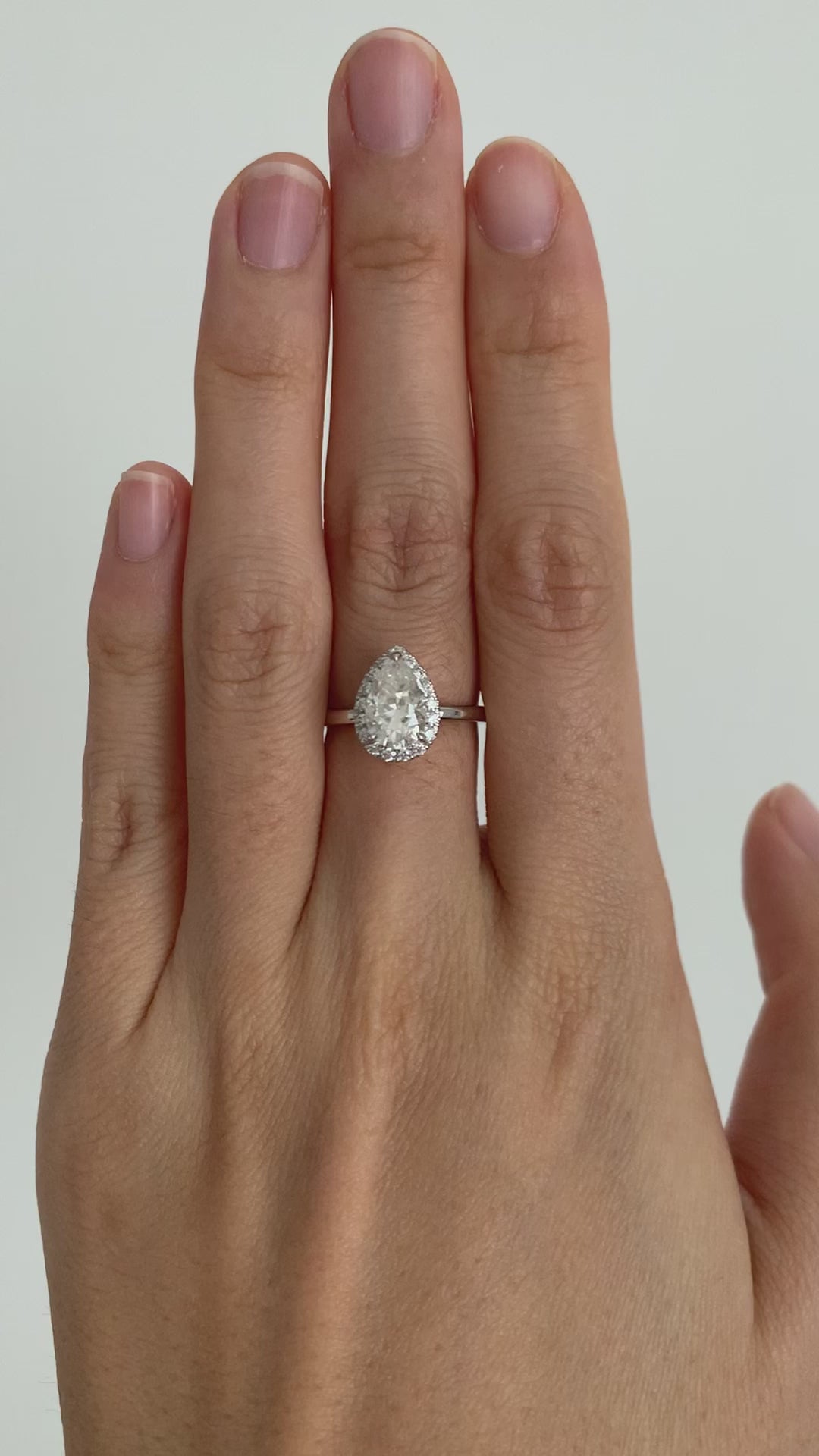 1.50ct 9x6mm Pear Moissanite Platinum Halo Plain