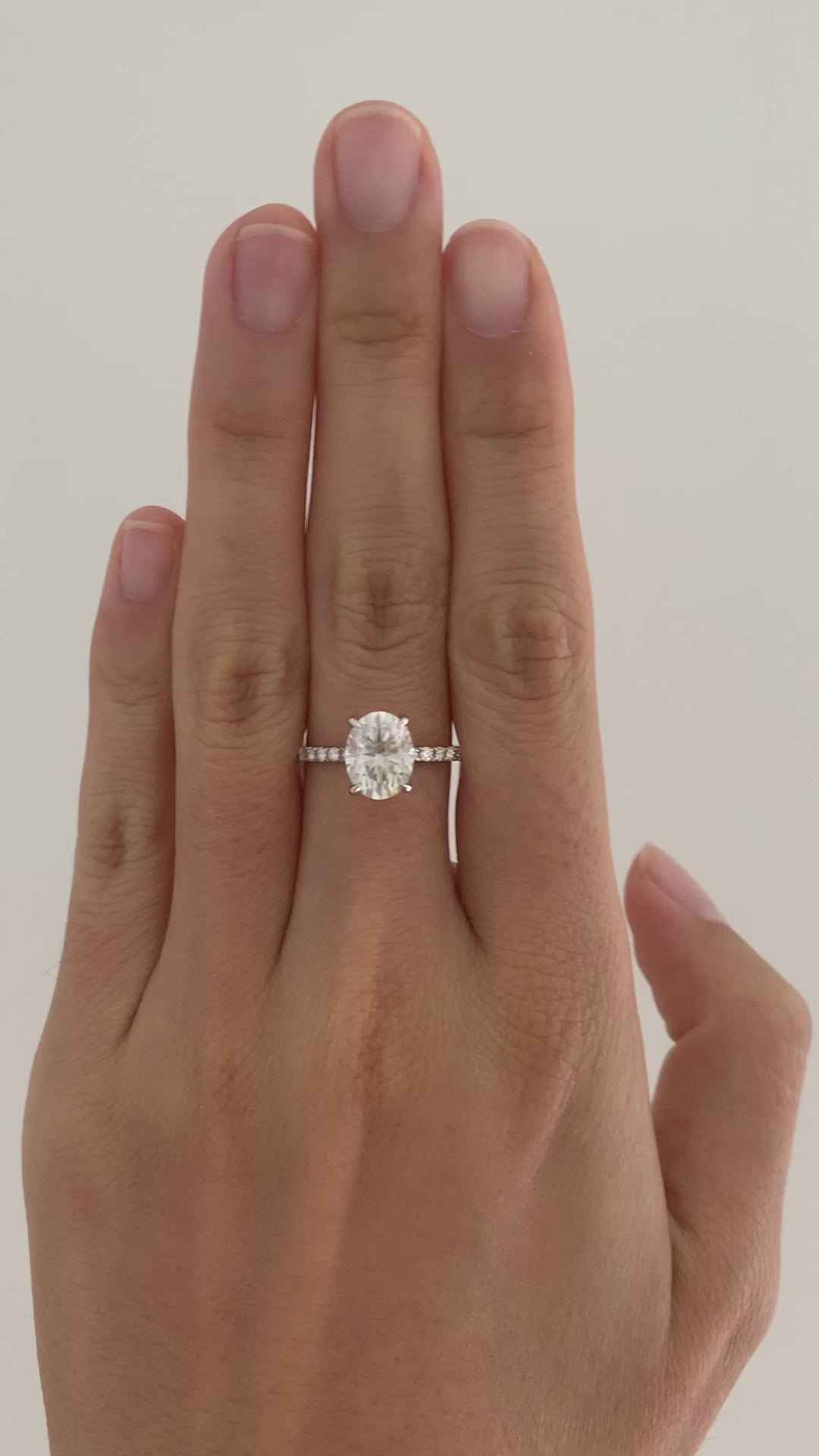 2.10ct 9x7mm Oval Moissanite 14k White Gold Pave