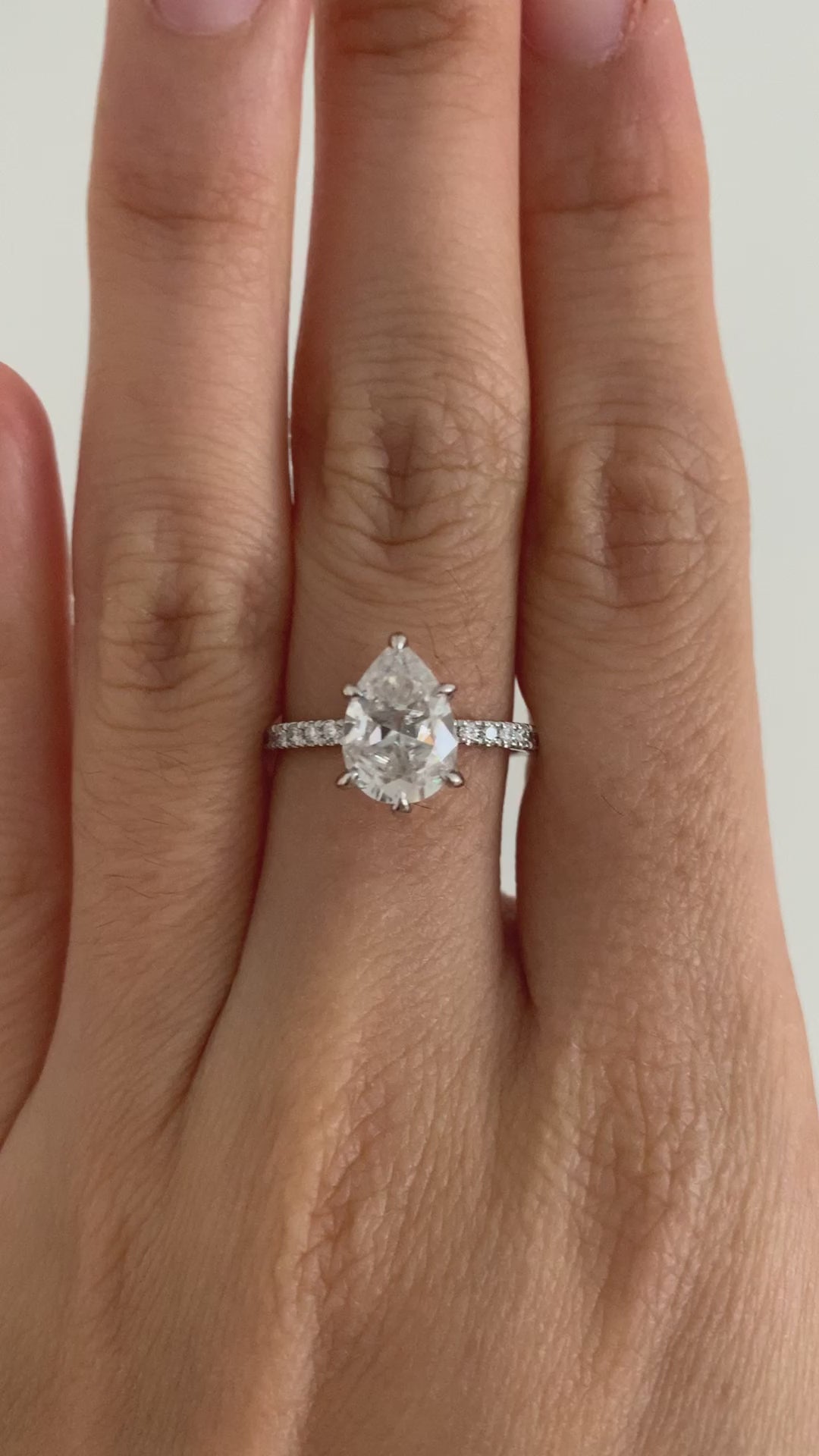 2.10ct 10x7mm Pear Moissanite Platinum Pave