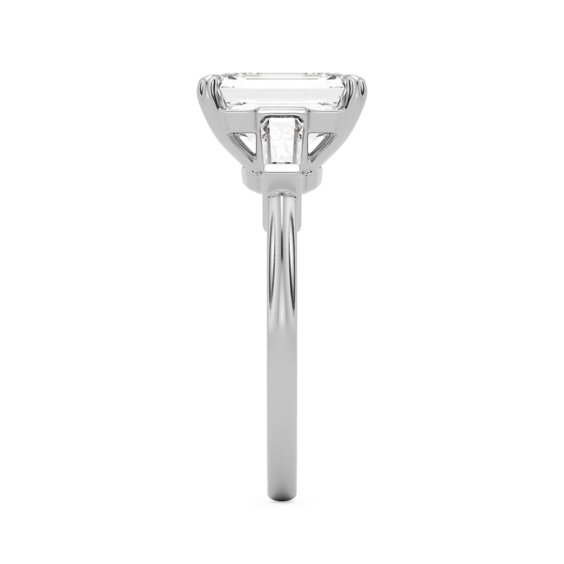 emerald moissanite three stone platinum