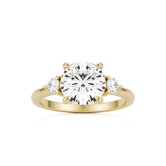 round moissanite three stone 14k yellow gold