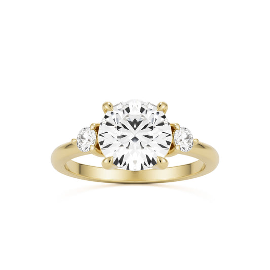 round moissanite three stone 14k yellow gold