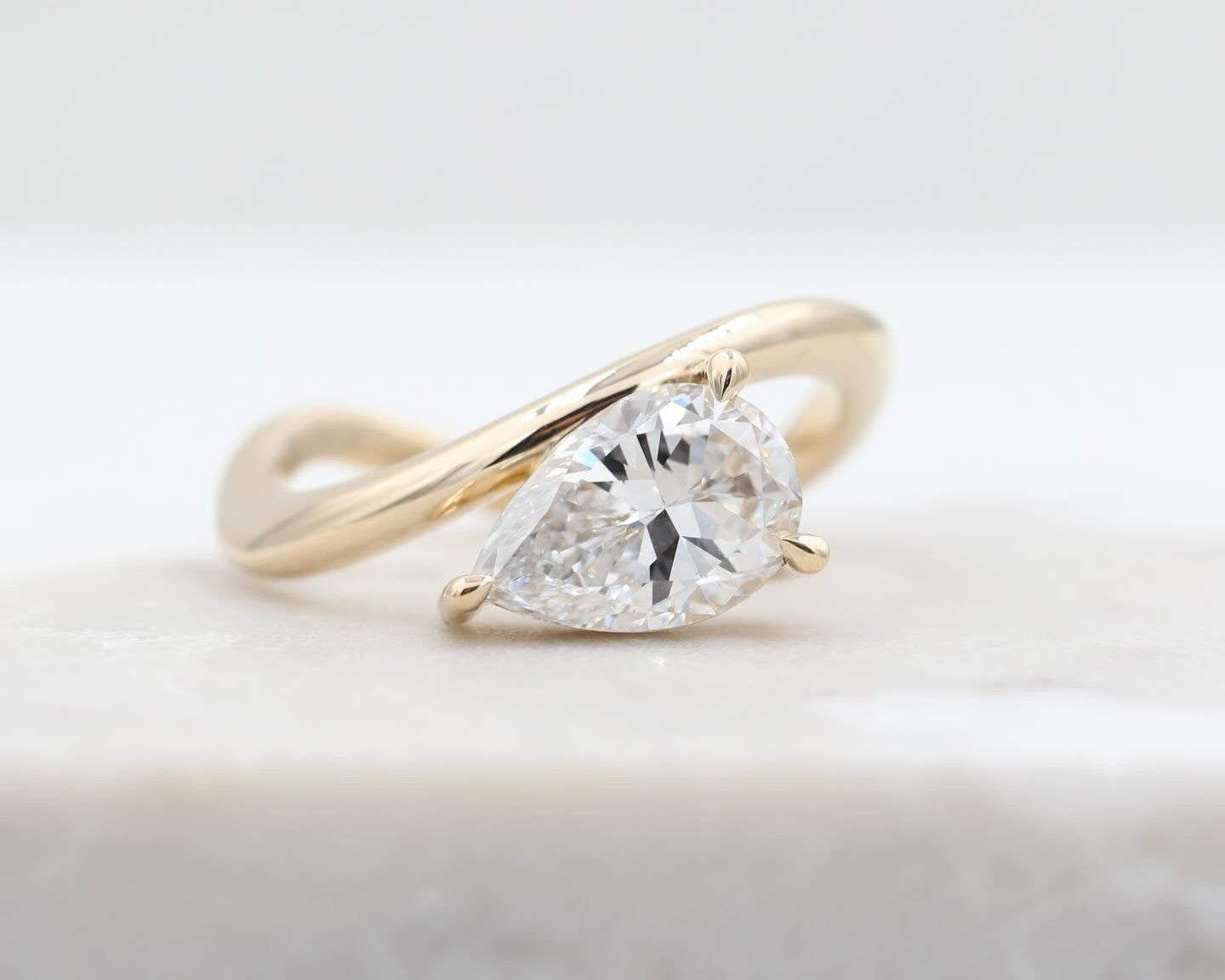 Custom moissanite pear solitaire curved engagement ring