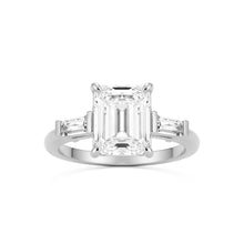 emerald moissanite three stone platinum